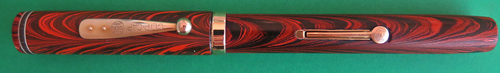 WATERMAN'S No. 7 FOUNTAIN PEN IN RED RIPPLE WITH BROAD FLEXIBLE NIB.